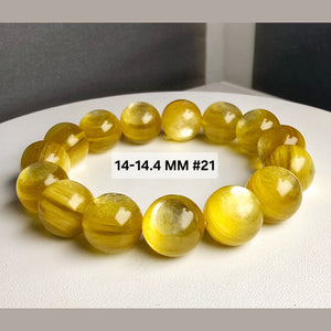 黄金鋰雲母水晶手鍊 14-14.4MM 15粒 21號的黄金色澤與晶體細節。 巴西產,  適合手圍至18cm,  香港正品認證