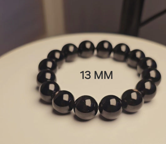 本段影片完整展示極級金運石手鍊 13MM 16粒的黑色色澤與晶體細節。適合手圍至18cm, 香港正品認證